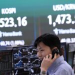 Asia shares mixed following Wall Street’s losses, as oil price edges lower