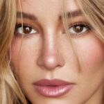 Hassie Harrison Dives into Fox’s ‘Baywatch’ Reboot, Charting a Course for a New Era of Lifeguard Legends