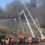 Officials say 14 were killed in fire at South Korean auto parts plant